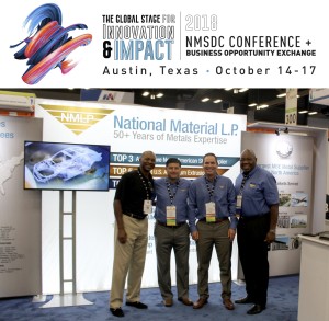 Image of National Material employees standing in front of their new trade show booth at the NMSDC conference in Austin, Texas